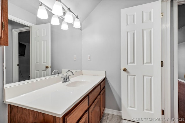 10672 E Canyon Oaks Ct, Claremore, OK 74017 - bathroom featuring vanity and marble look tiles