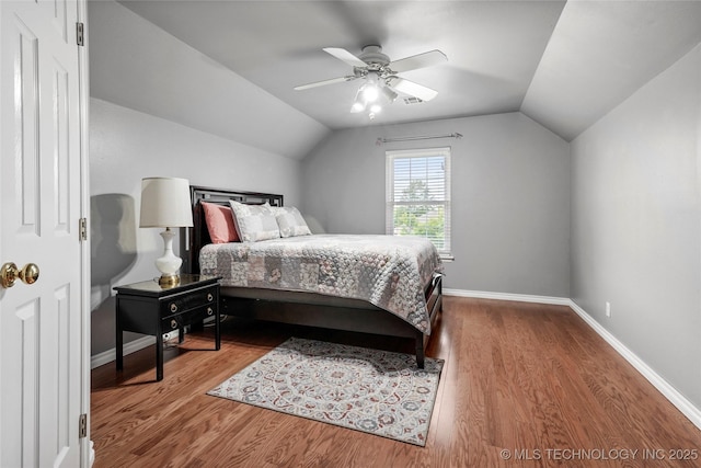 10672 E Canyon Oaks Ct, Claremore, OK 74017 - bedroom with lofted ceiling, wood finished floors, and a ceiling fan