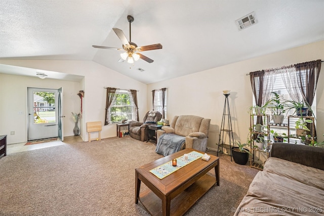 93 W Fairlane Pl, Sapulpa, OK 74066 - carpeted living room with a ceiling fan, lofted ceiling, and healthy amount of natural light