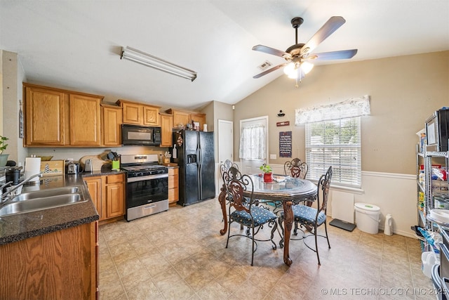 93 W Fairlane Pl, Sapulpa, OK 74066 - kitchen featuring black appliances, dark countertops, ceiling fan, lofted ceiling, and brown cabinets