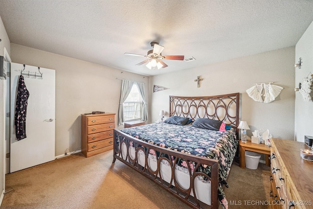 93 W Fairlane Pl, Sapulpa, OK 74066 - bedroom featuring light colored carpet, ceiling fan, and a textured ceiling
