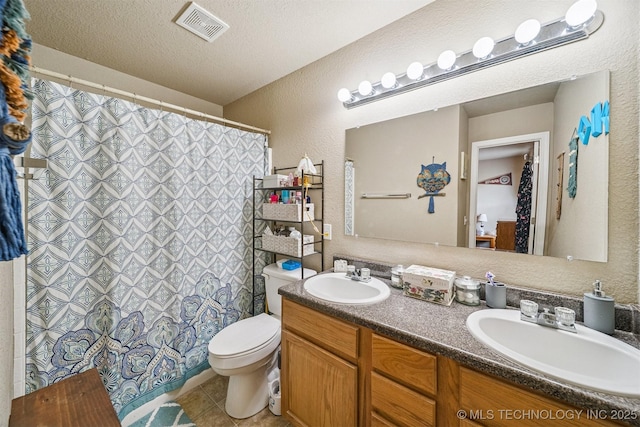 93 W Fairlane Pl, Sapulpa, OK 74066 - bathroom with double vanity, a textured wall, tile patterned flooring, and a shower with curtain
