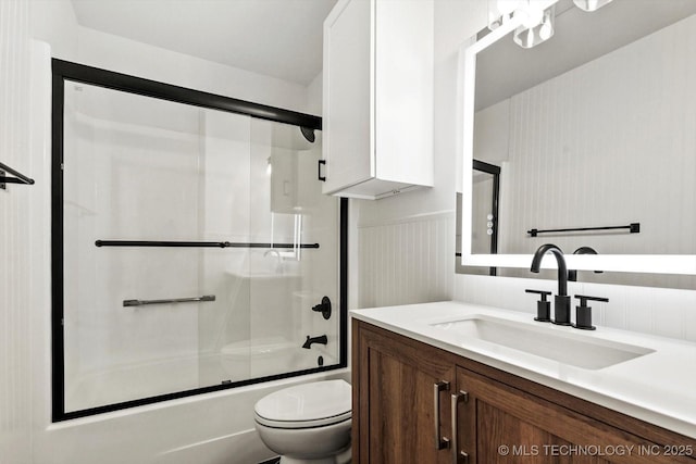 1847 W 57th Pl, Tulsa, OK 74107 - bathroom with vanity and enclosed tub / shower combo