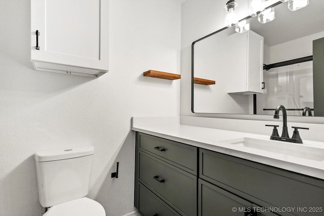 1847 W 57th Pl, Tulsa, OK 74107 - bathroom featuring vanity and toilet
