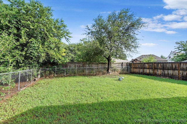 1847 W 57th Pl, Tulsa, OK 74107 - view of fenced backyard