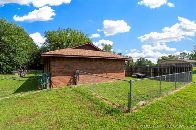 2608 Hickory Bluff Rd, Sapulpa, OK 74066 - view of property exterior featuring brick siding
