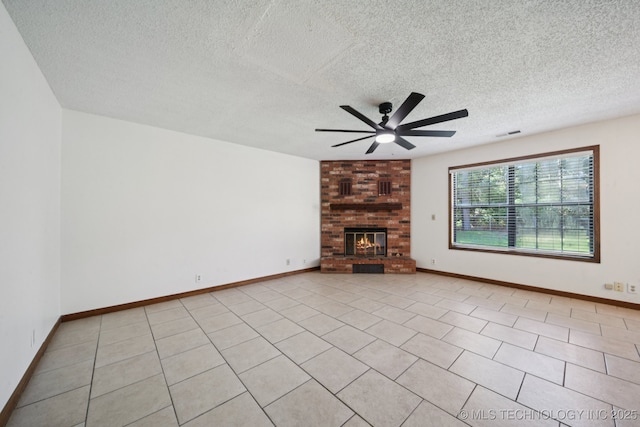 126 Birch Dr, Mannford, OK 74044 - unfurnished living room featuring a ceiling fan, a textured ceiling, and a brick fireplace