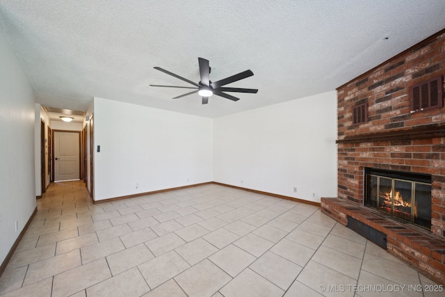 126 Birch Dr, Mannford, OK 74044 - unfurnished living room featuring a brick fireplace, ceiling fan, a textured ceiling, and light tile patterned floors