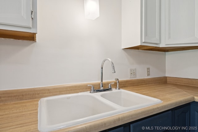 126 Birch Dr, Mannford, OK 74044 - kitchen with white cabinetry and light countertops