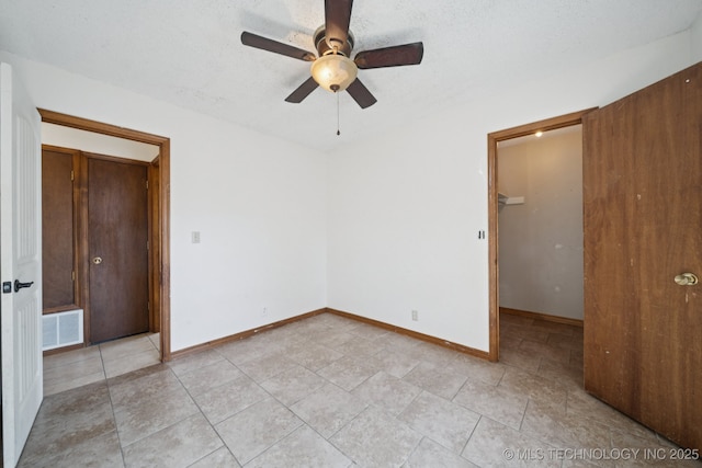 126 Birch Dr, Mannford, OK 74044 - empty room featuring ceiling fan and light tile patterned floors