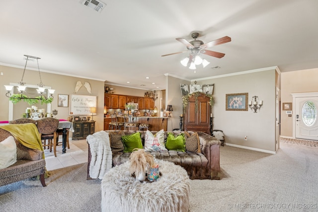 8702 N 140th Ter, Owasso, OK 74055 - living room with light colored carpet, a chandelier, ceiling fan, ornamental molding, and light tile patterned floors