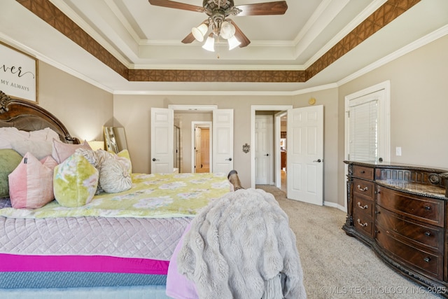 8702 N 140th Ter, Owasso, OK 74055 - bedroom with light carpet, a raised ceiling, crown molding, and ceiling fan