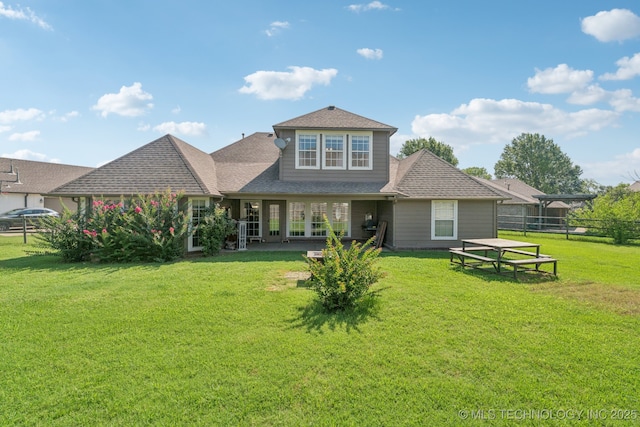 8702 N 140th Ter, Owasso, OK 74055 - back of property with a shingled roof