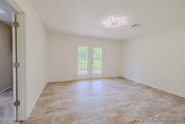 16547 County Road 1600, Ada, OK 74820 - empty room featuring french doors