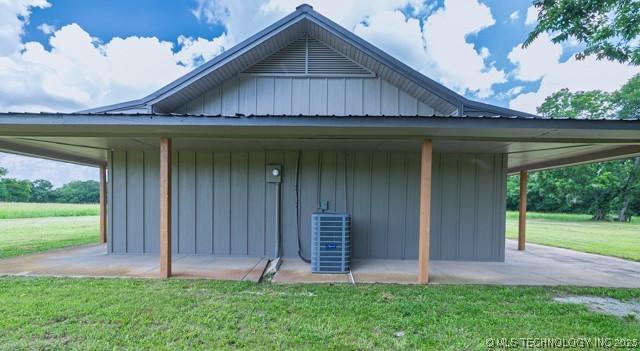 16547 County Road 1600, Ada, OK 74820 - view of side of property with a yard and a patio