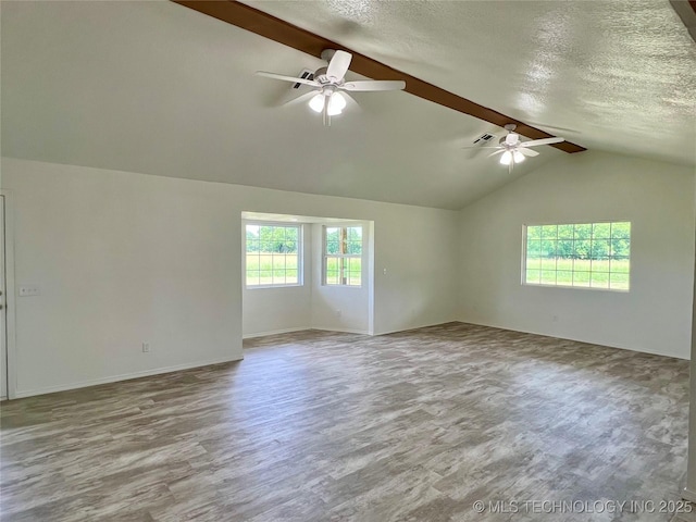 16547 County Road 1600, Ada, OK 74820 - empty room with a ceiling fan, wood finished floors, and a textured ceiling