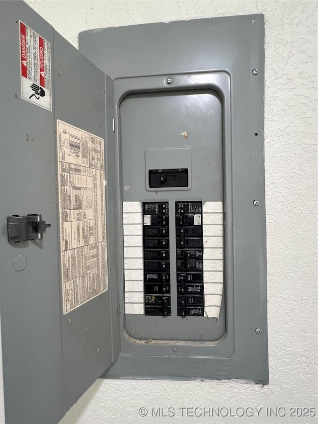 16547 County Road 1600, Ada, OK 74820 - utility room featuring electric panel