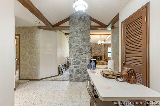 12725 S 168th E Ave, Broken Arrow, OK 74011 - dining space featuring a fireplace, ornate columns, and vaulted ceiling