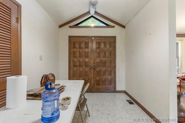 12725 S 168th E Ave, Broken Arrow, OK 74011 - foyer entrance featuring light floors and vaulted ceiling