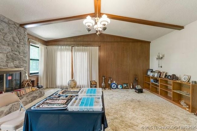 12725 S 168th E Ave, Broken Arrow, OK 74011 - carpeted bedroom with a chandelier, a stone fireplace, wood walls, and a textured ceiling