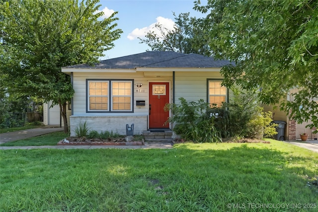 6711 E 10th St, Tulsa, OK 74112 - view of front facade with a front lawn, entry steps, and a shingled roof