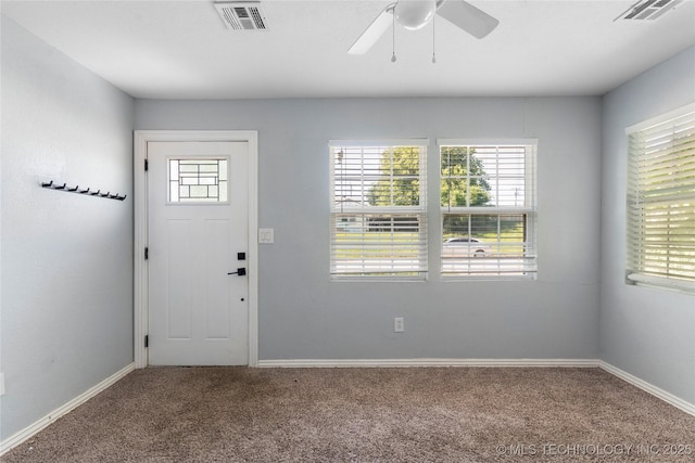 6711 E 10th St, Tulsa, OK 74112 - carpeted entrance foyer with a ceiling fan and baseboards
