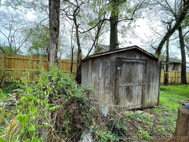 1225 S Quaker Ave, Tulsa, OK 74120 - view of shed with a fenced backyard