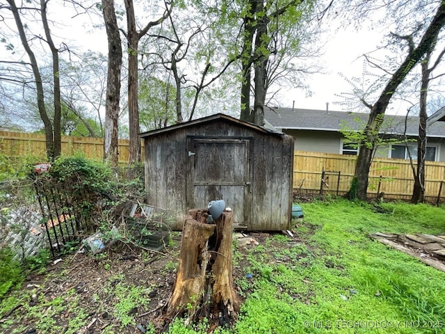 1225 S Quaker Ave, Tulsa, OK 74120 - view of shed with a fenced backyard