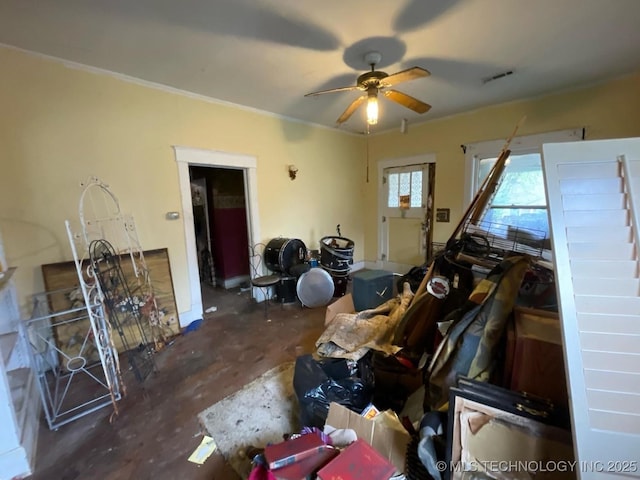 1225 S Quaker Ave, Tulsa, OK 74120 - living area featuring ceiling fan, concrete floors, and crown molding