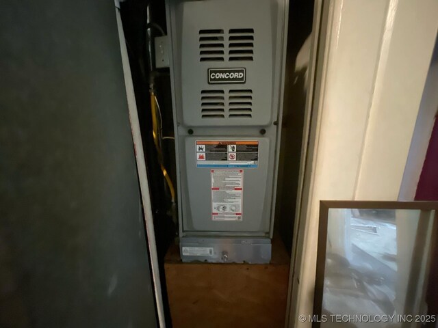 1225 S Quaker Ave, Tulsa, OK 74120 - utility room with heating unit