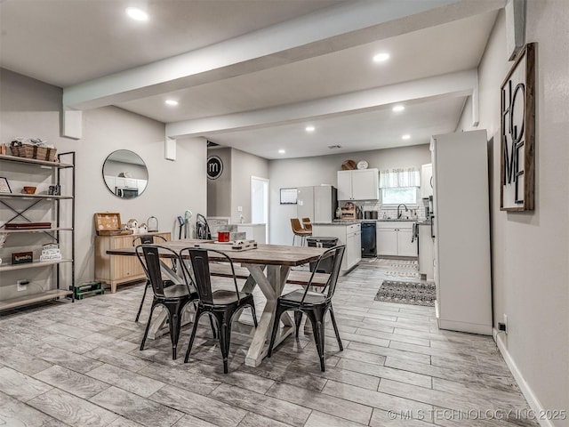 310 W Lee Ave, Sapulpa, OK 74066 - dining area featuring wood finish floors, beamed ceiling, and recessed lighting