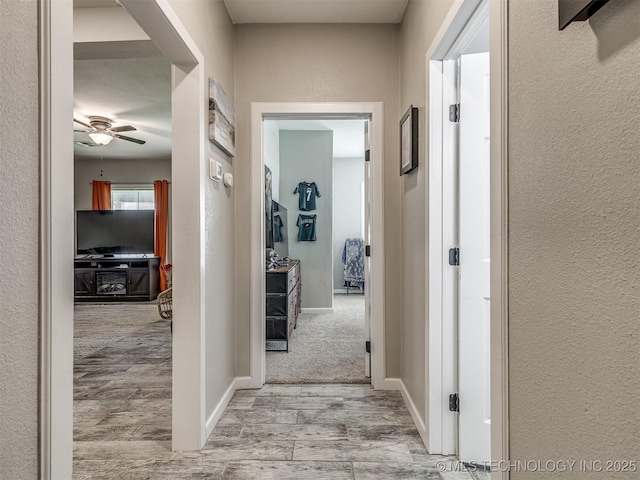310 W Lee Ave, Sapulpa, OK 74066 - corridor with wood finished floors and a textured wall