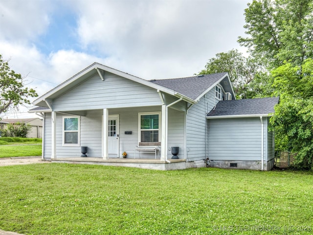 310 W Lee Ave, Sapulpa, OK 74066 - bungalow featuring a front lawn, a porch, and a shingled roof