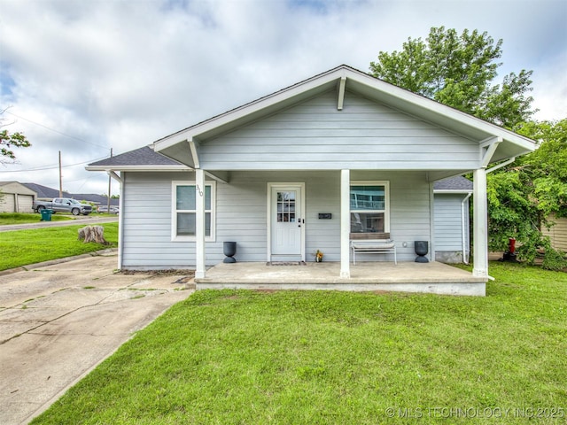 310 W Lee Ave, Sapulpa, OK 74066 - bungalow-style house with a front lawn and covered porch