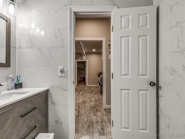 310 W Lee Ave, Sapulpa, OK 74066 - bathroom featuring vanity and tile walls