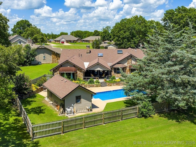 6429 Clear Creek Loop, Bartlesville, OK 74006 - view of swimming pool featuring a fenced backyard and a residential view