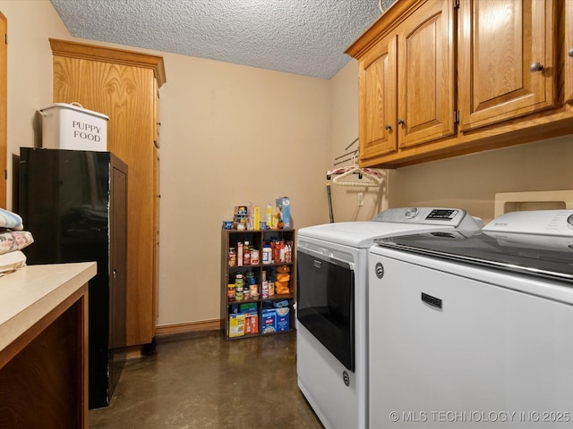 6429 Clear Creek Loop, Bartlesville, OK 74006 - laundry room with separate washer and dryer, cabinet space, and a textured ceiling