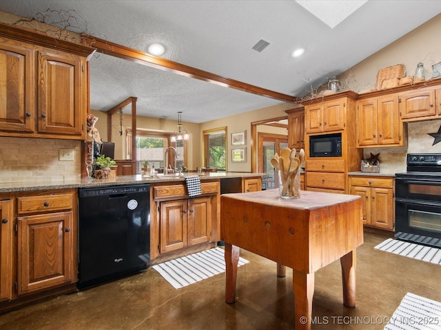 6429 Clear Creek Loop, Bartlesville, OK 74006 - kitchen with black appliances, tasteful backsplash, a peninsula, brown cabinets, and a textured ceiling