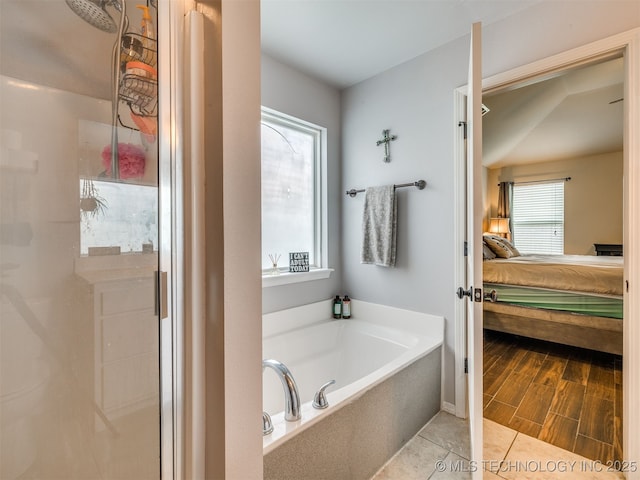 3409 E Quebec St, Broken Arrow, OK 74014 - ensuite bathroom with a garden tub, a shower, and tile patterned flooring