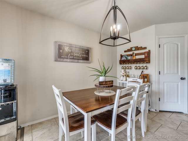 3409 E Quebec St, Broken Arrow, OK 74014 - dining area featuring light tile patterned floors and a chandelier