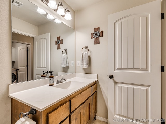 3409 E Quebec St, Broken Arrow, OK 74014 - bathroom with vanity and baseboards