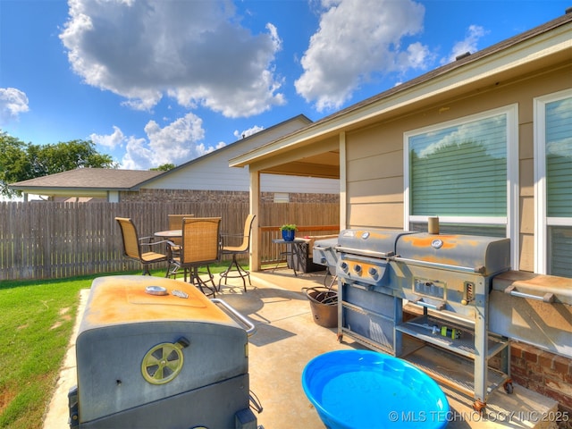3409 E Quebec St, Broken Arrow, OK 74014 - view of patio featuring grilling area and outdoor dining space
