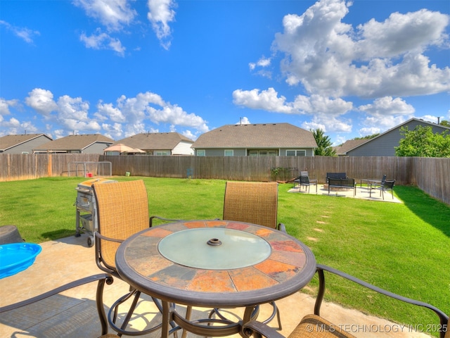 3409 E Quebec St, Broken Arrow, OK 74014 - fenced backyard featuring a patio area and a residential view