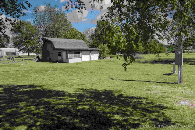 12931 N 135th E Ave, Collinsville, OK 74021 - view of green lawn with an outdoor structure