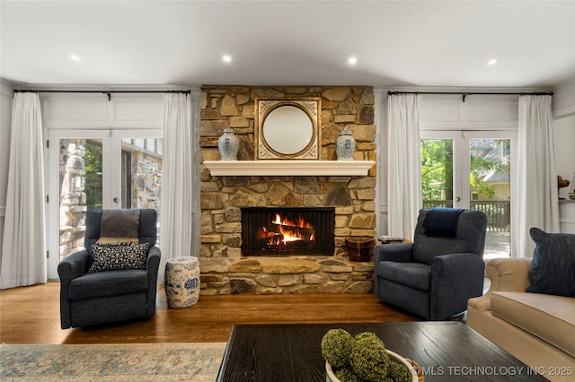 6530 E 106th St, Tulsa, OK 74133 - living area featuring a fireplace, wood finished floors, and recessed lighting