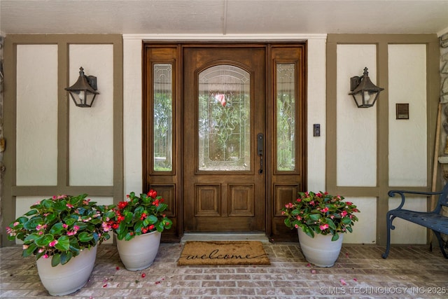 6530 E 106th St, Tulsa, OK 74133 - doorway to property featuring stucco siding