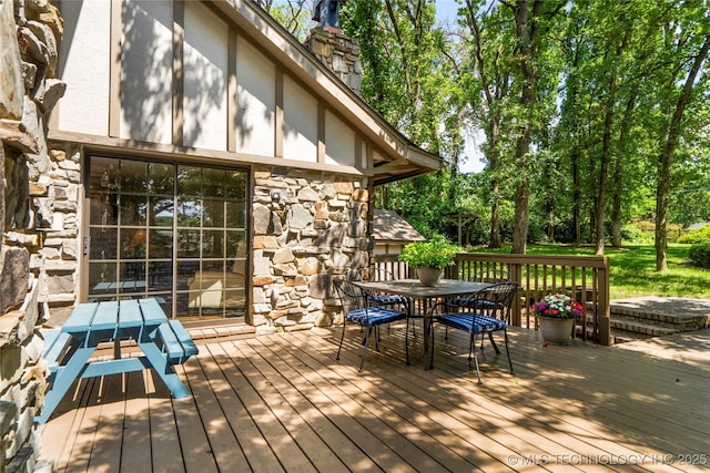 6530 E 106th St, Tulsa, OK 74133 - wooden terrace with outdoor dining space