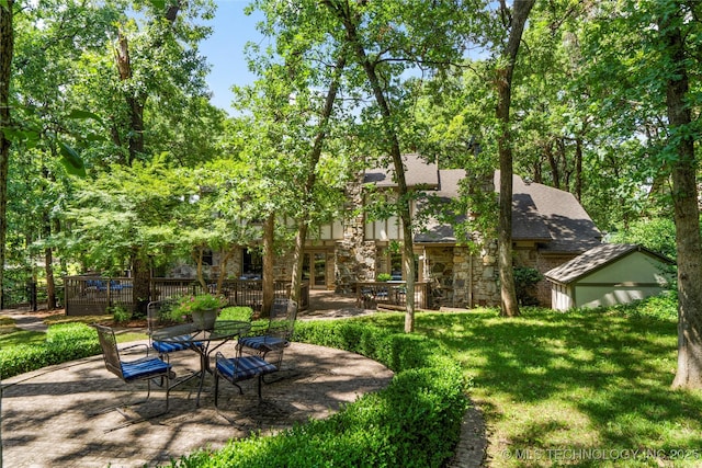 6530 E 106th St, Tulsa, OK 74133 - view of grassy yard featuring a patio
