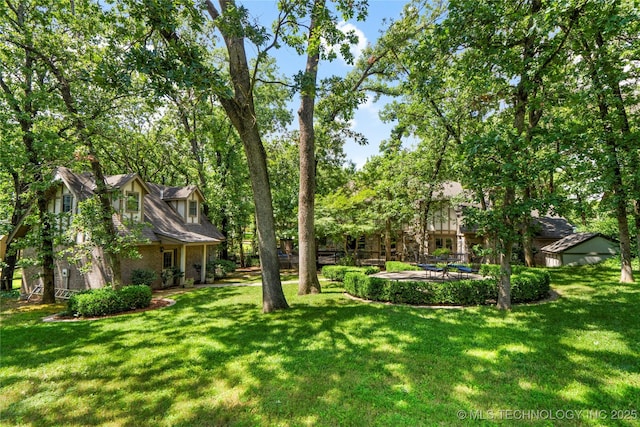 6530 E 106th St, Tulsa, OK 74133 - view of grassy yard with view of scattered trees