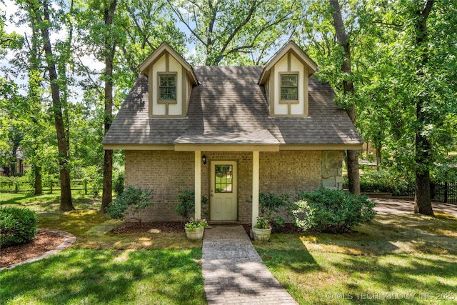6530 E 106th St, Tulsa, OK 74133 - view of front of house with brick siding and a shingled roof